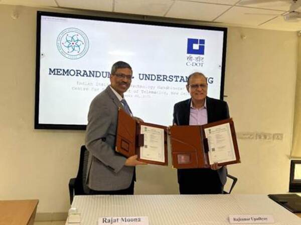Dr. Rajkumar Upadhyay, CEO of C-DOT, and Dr. Rajat Moona, Director of IIT Gandhinagar after the signing ceremony of the MoU